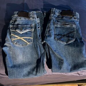 2 pair TK Axel Mens Jeans. Good used condition. Both size 30x32. Slim bootcut.